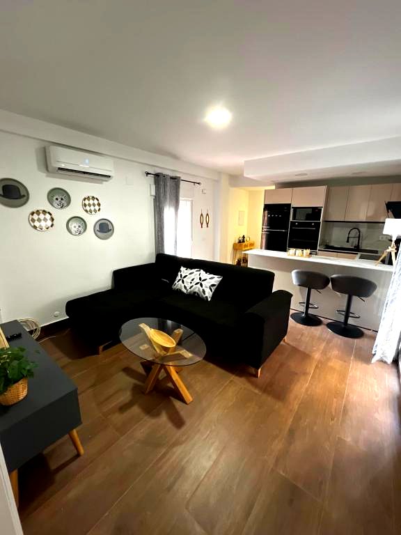 Salón y cocina · Apartamento Argote de Molina